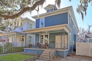 A two-story house with a porch, a front door, and a mailbox. - Savanah Home, Walkable Downtown, 30+ Days (Savannah)