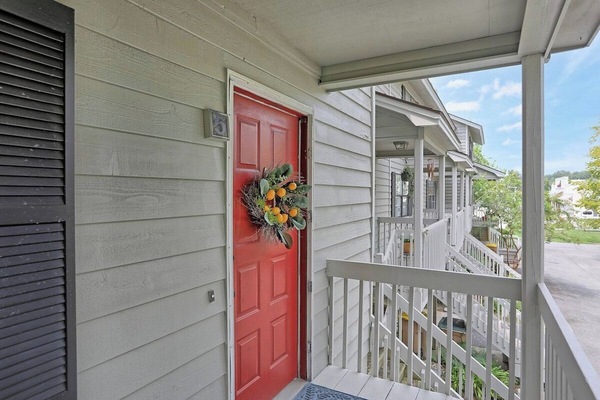 Welcome home—step onto the covered porch and through the front door to your Savannah retreat.