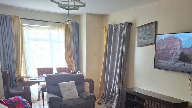 Living area - 2-bedroom apartment with AC in quaint Nairobi neighborhood (Nairobi)