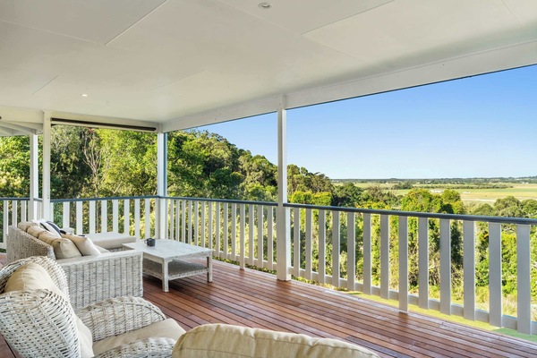 Spacious treetop retreat surrounded by lush established gardens and greenery