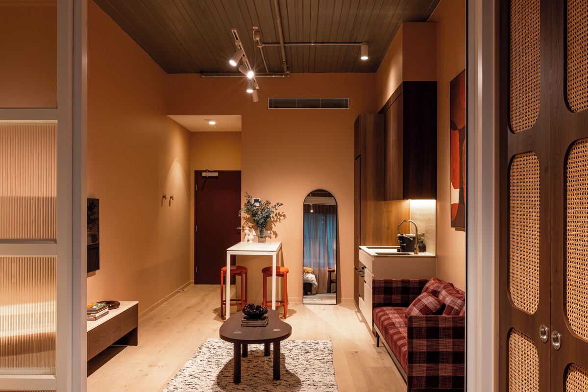 Deluxe Studio | In-room safe, desk, laptop workspace, blackout curtains