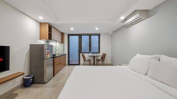 Desk, laptop workspace, blackout curtains, free WiFi