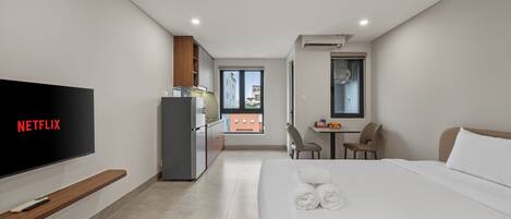 Desk, laptop workspace, blackout curtains, free WiFi