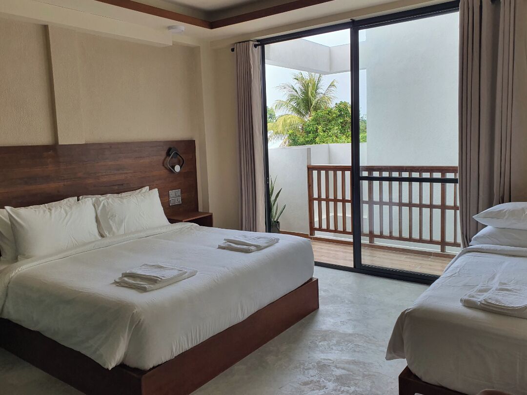 Deluxe Triple Room, Balcony, Courtyard Area