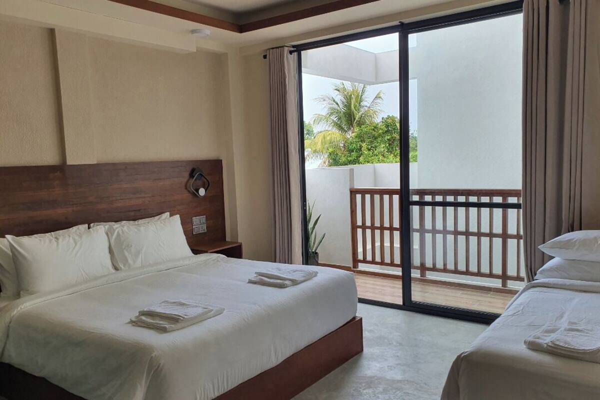 Deluxe Triple Room, Balcony, Courtyard Area