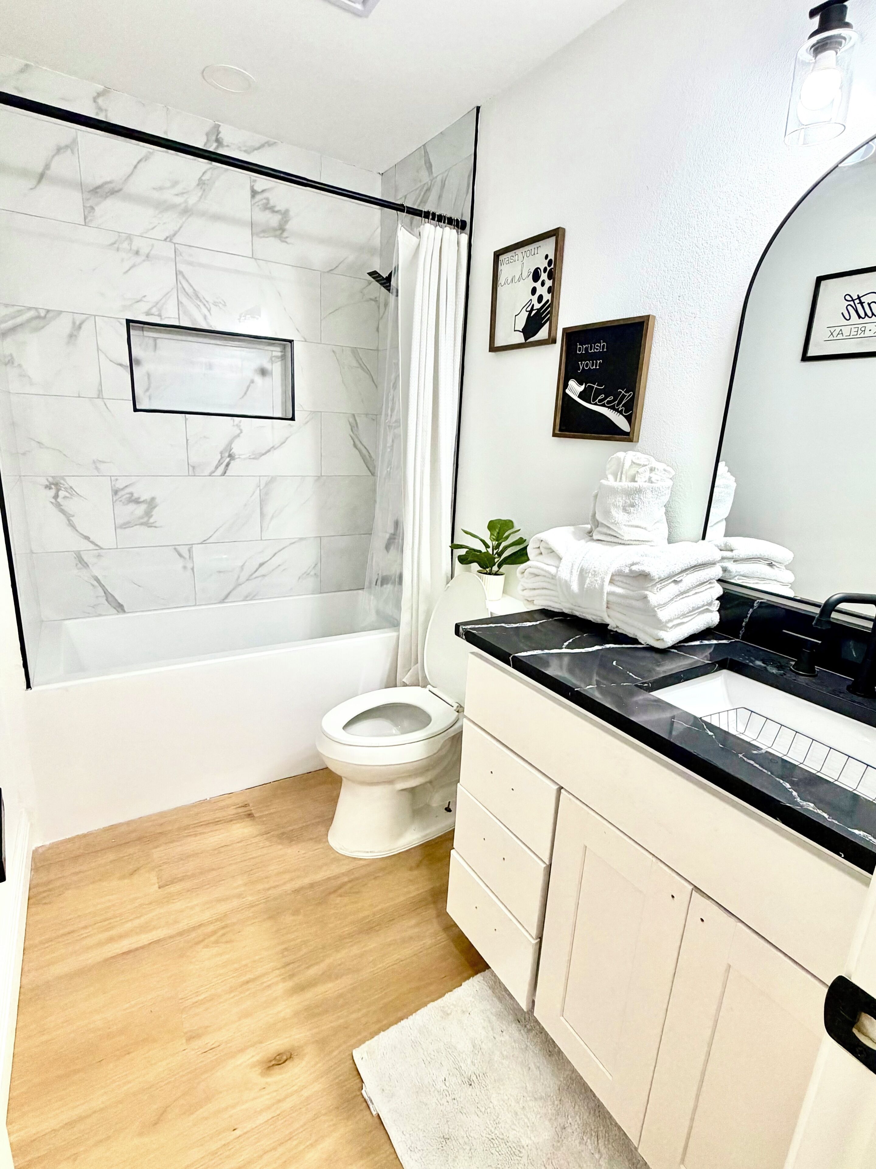 Shower, hair dryer, towels, toilet paper