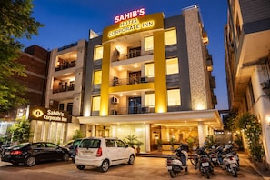 A multi-story building with a sign reading 'Sahib's Corporate Inn.' - Hotel Sahibs Corporate Inn Jaipur (Jaipur)