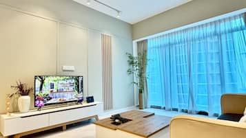 Suite Deluks, pemandangan kota | Area keluarga