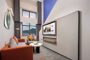 Studiosvit Business - utsikt mot bergen | Duntäcken, memory foam-madrasser och gratis produkter i minibar