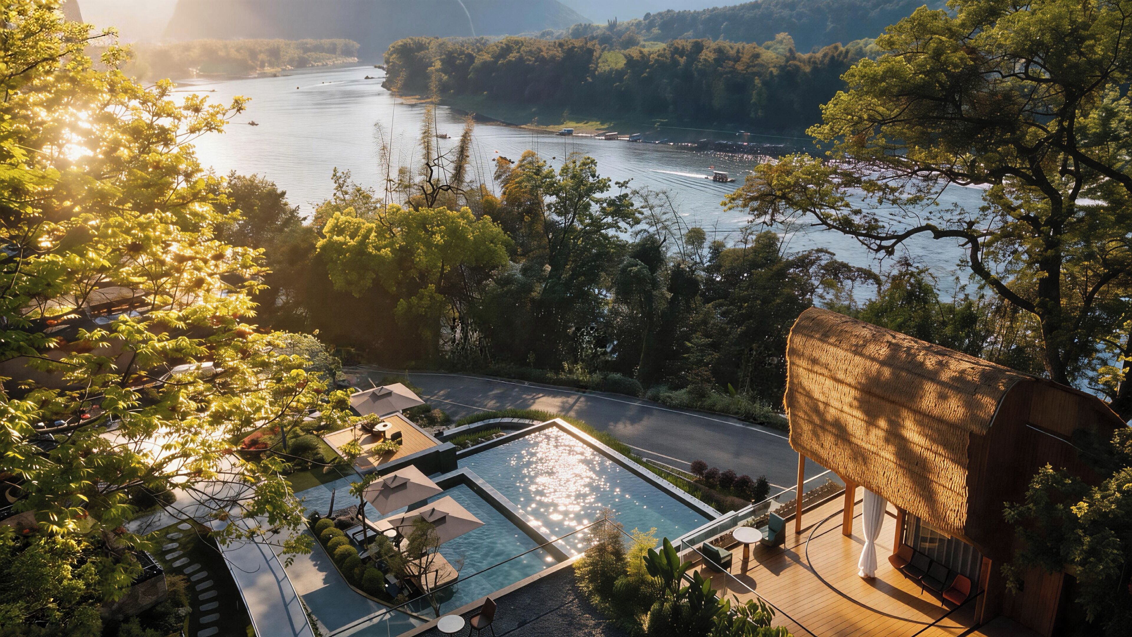 Un complexe hôtelier doté d’une piscine, d’une terrasse en bois et offrant une vue sur une rivière.