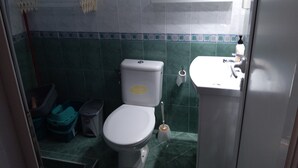 A bathroom with a toilet, bidet, and sink. - 3 rooms by the Black Sea (Sonnenstrand)