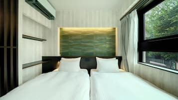 Blackout curtains, free WiFi, bed sheets