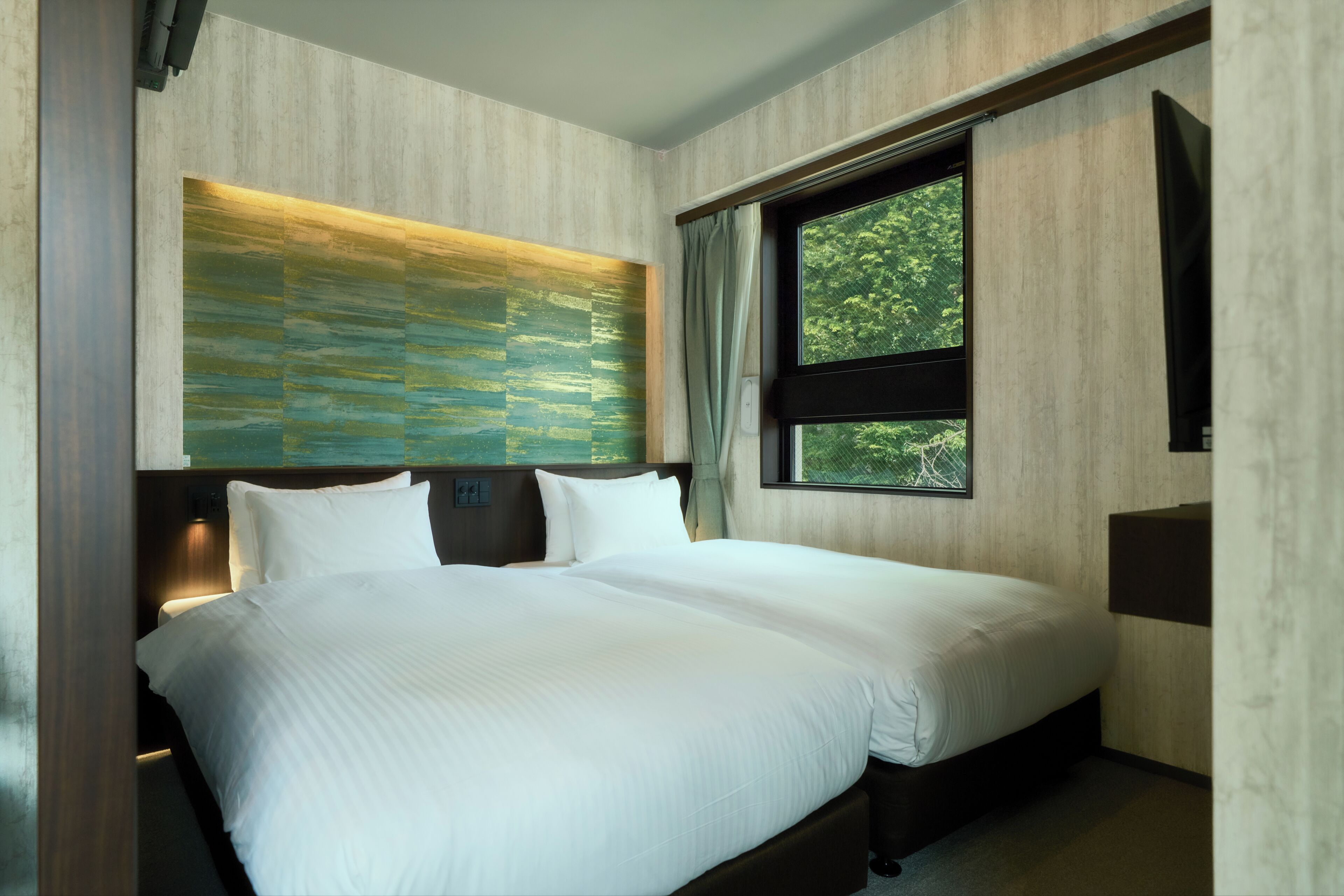 Habitación Deluxe con 2 camas individuales | Cortinas opacas, wifi gratis, ropa de cama