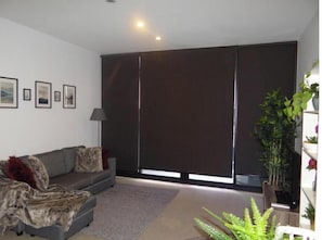 Living area - Spacious One-Bedroom Apartment with Spa & Sauna Access (South Yarra)