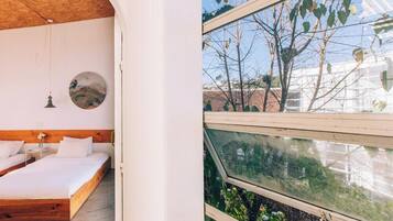 Standard Triple Room, Garden View | View from room
