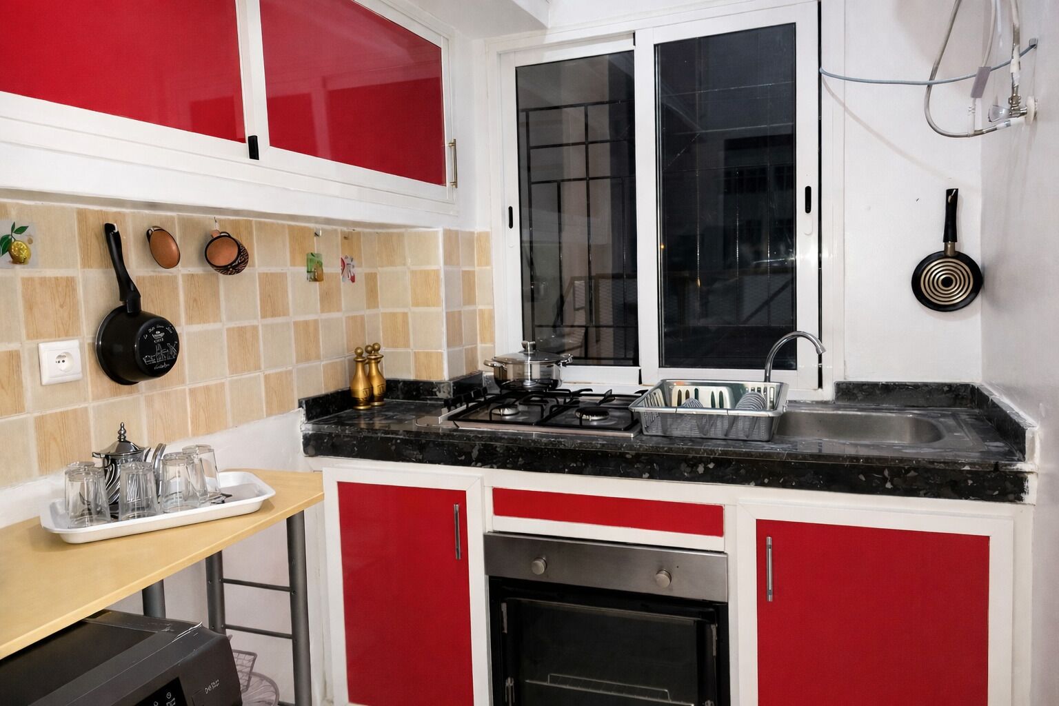 Fridge, oven, highchair, cookware/dishes/utensils