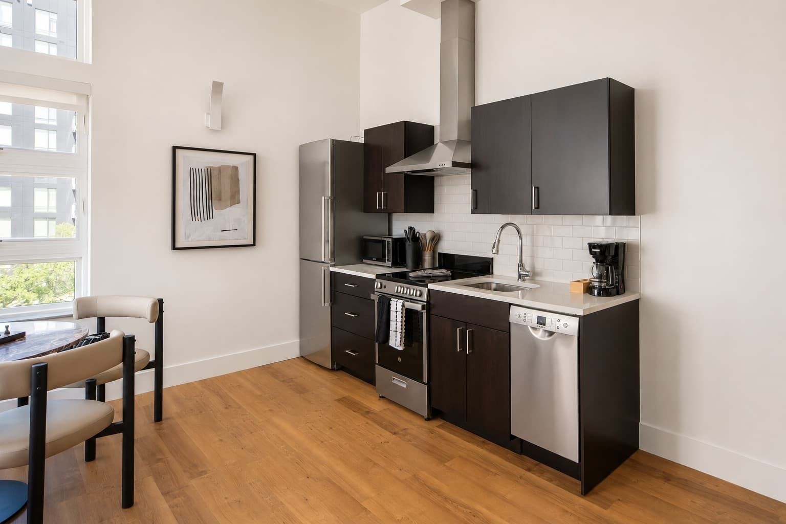 Coffee/tea maker, fridge, microwave, oven