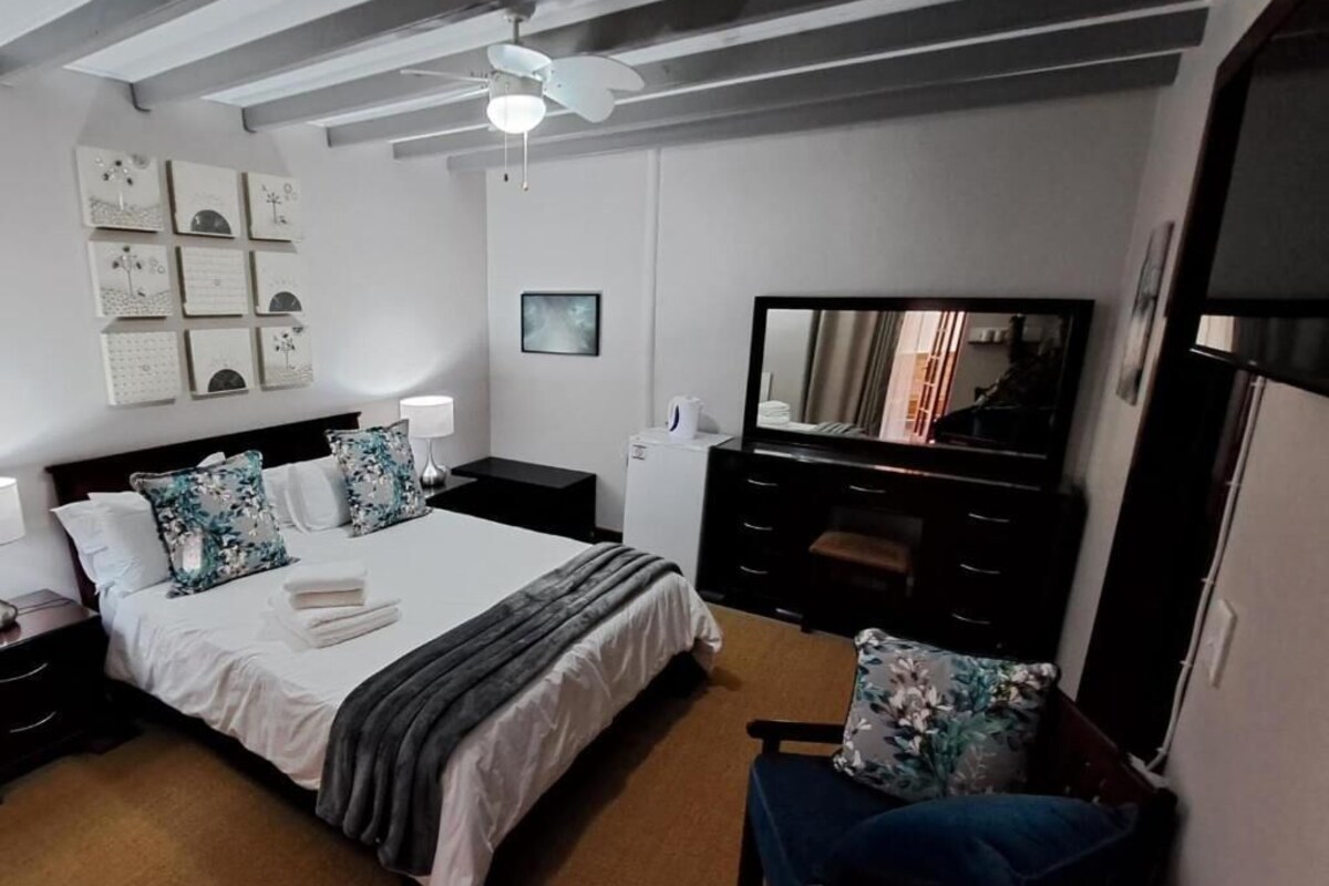 Habitació doble Comfort, pati, vistes al jardí | Caixa forta a l'habitació i wifi gratuïta 