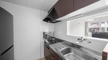 Apartment | Private kitchen | Fridge, microwave, stovetop, rice cooker