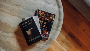 Two books on a round table.