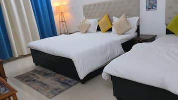 Deluxe Triple Room | Laptop workspace, iron/ironing board, free WiFi