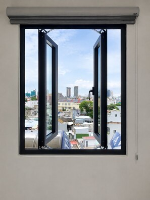 Deluxe Double Room, City View | Minibar, desk, blackout curtains, soundproofing - Ngoc Thuong Hotel & Apartment (An Hai)