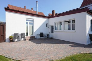 Classic-Apartment, Gartenblick | Speisen im Freien