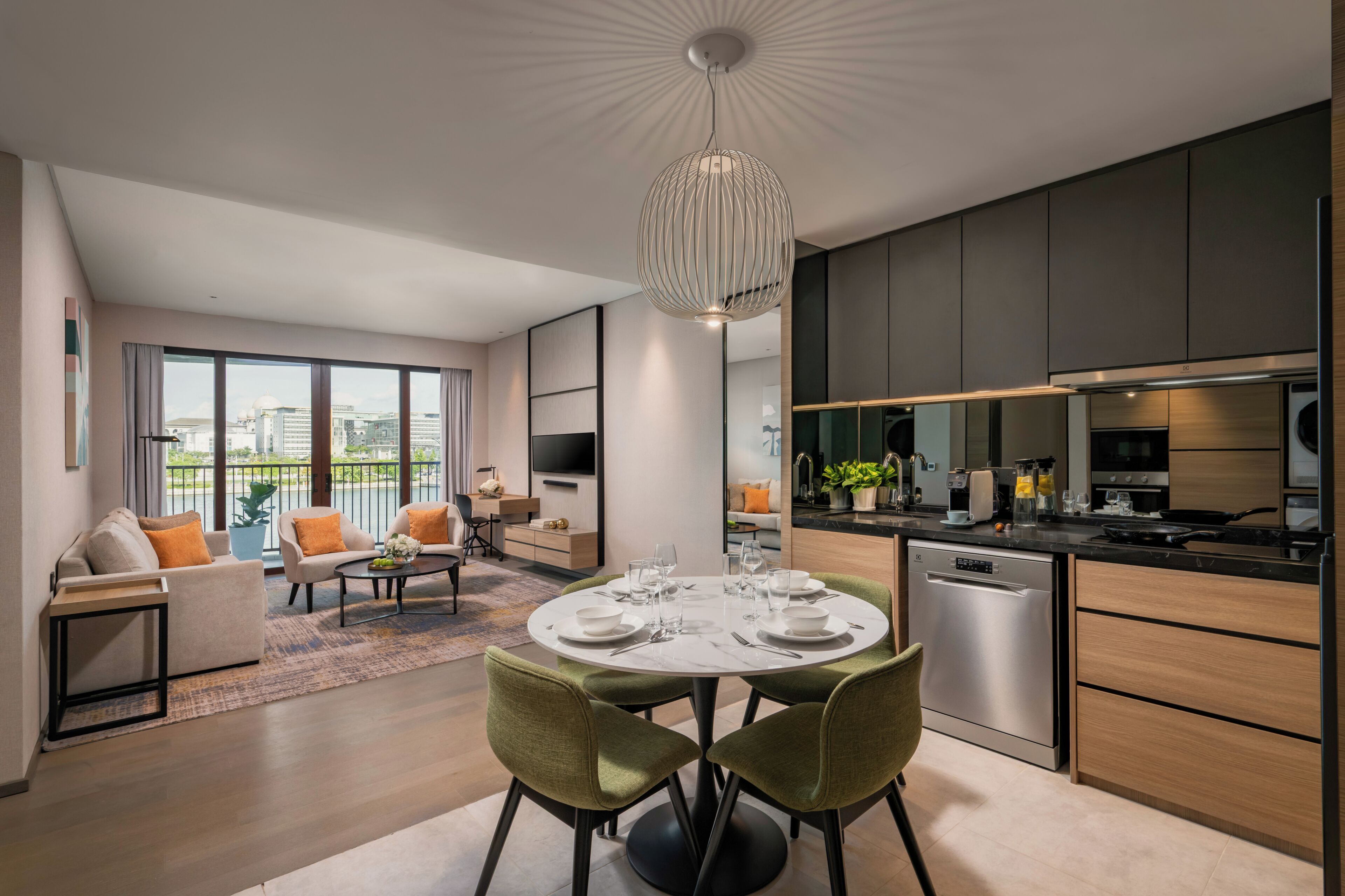 Un apartamento moderno con comedor, cocina y sala de estar.