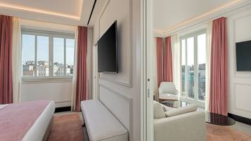 Superior Suite | Living area | 34-inch plasma TV with cable channels
