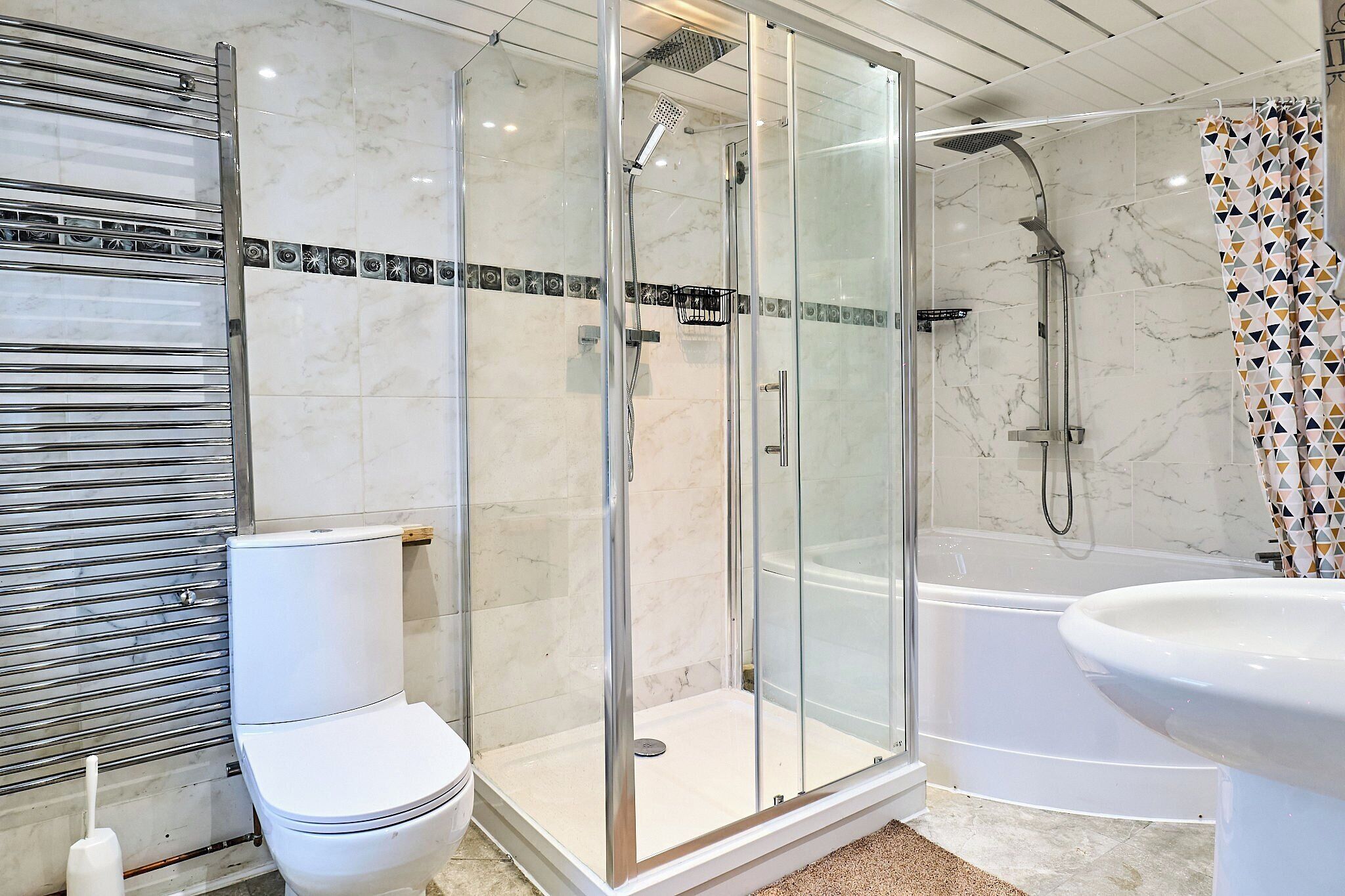 Separate tub and shower, deep soaking tub, towels