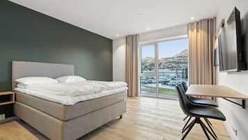 Studio, Multiple Beds, Kitchenette, City View | Desk, laptop workspace, free WiFi