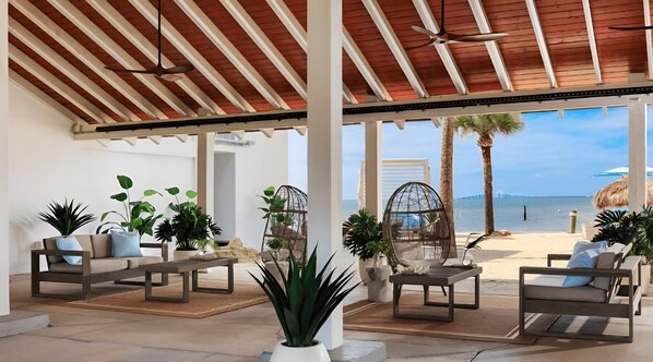 Terrace/patio - Modern Beach Retreat | Oceanfront Balcony, Marina Dining Near Local Attractions (St. Petersburg)