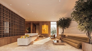 A modern interior with a reception desk, seating area, and a large window. - Hotel Camelot By Artur (Ksamil)