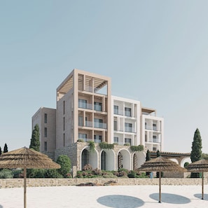 A modern multi-story building with balconies, a stone facade, and arched windows. - Hotel Camelot By Artur (Ksamil)