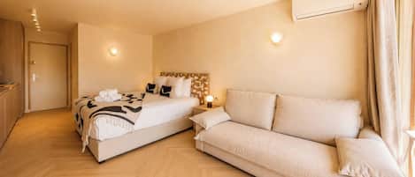 Apartment | Laptop workspace, iron/ironing board, bed sheets