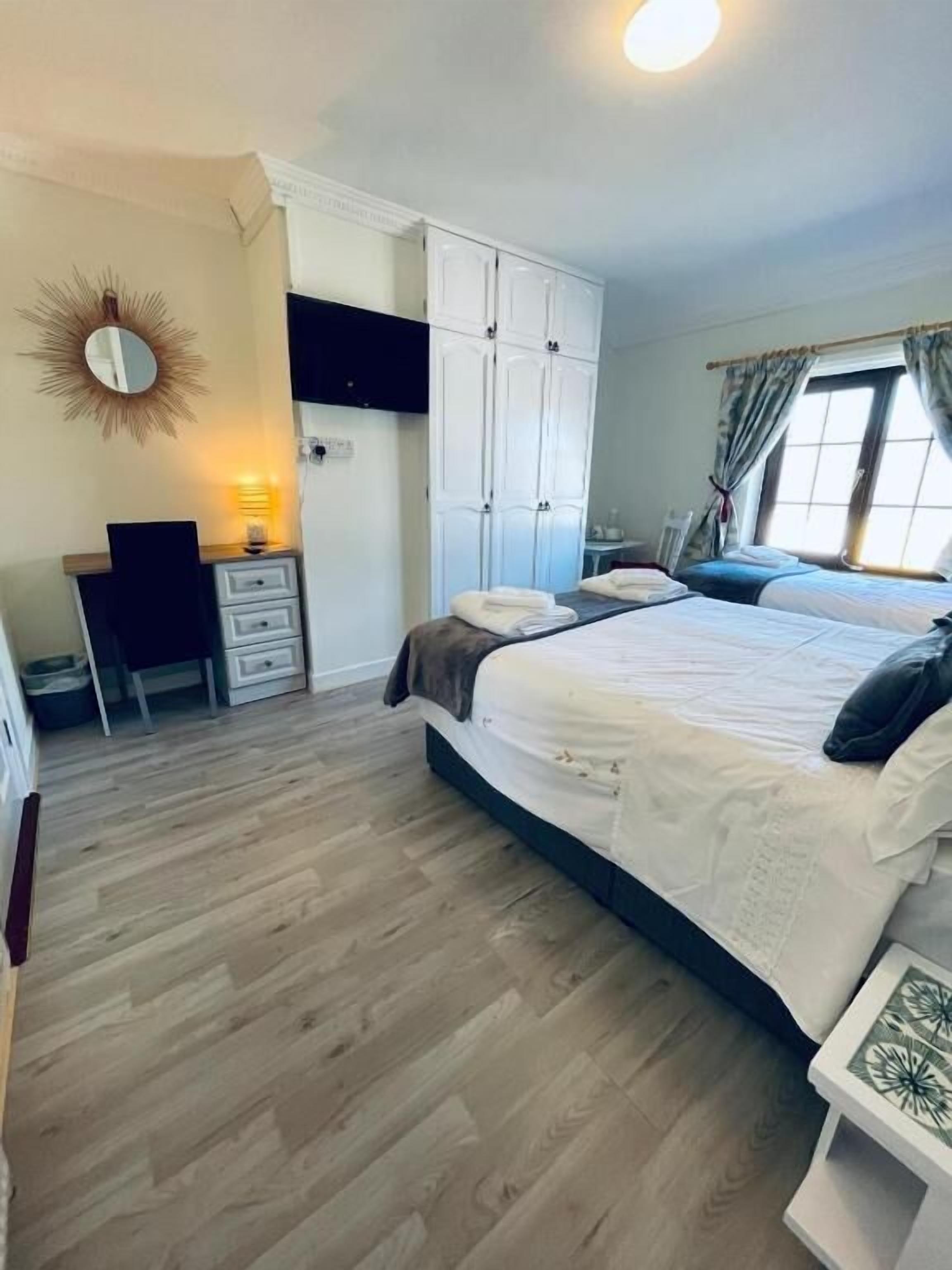 Basic Triple Room, Partial Sea View | Desk, laptop workspace, free WiFi