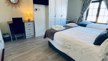 Basic Triple Room, Partial Sea View | Desk, laptop workspace, free WiFi