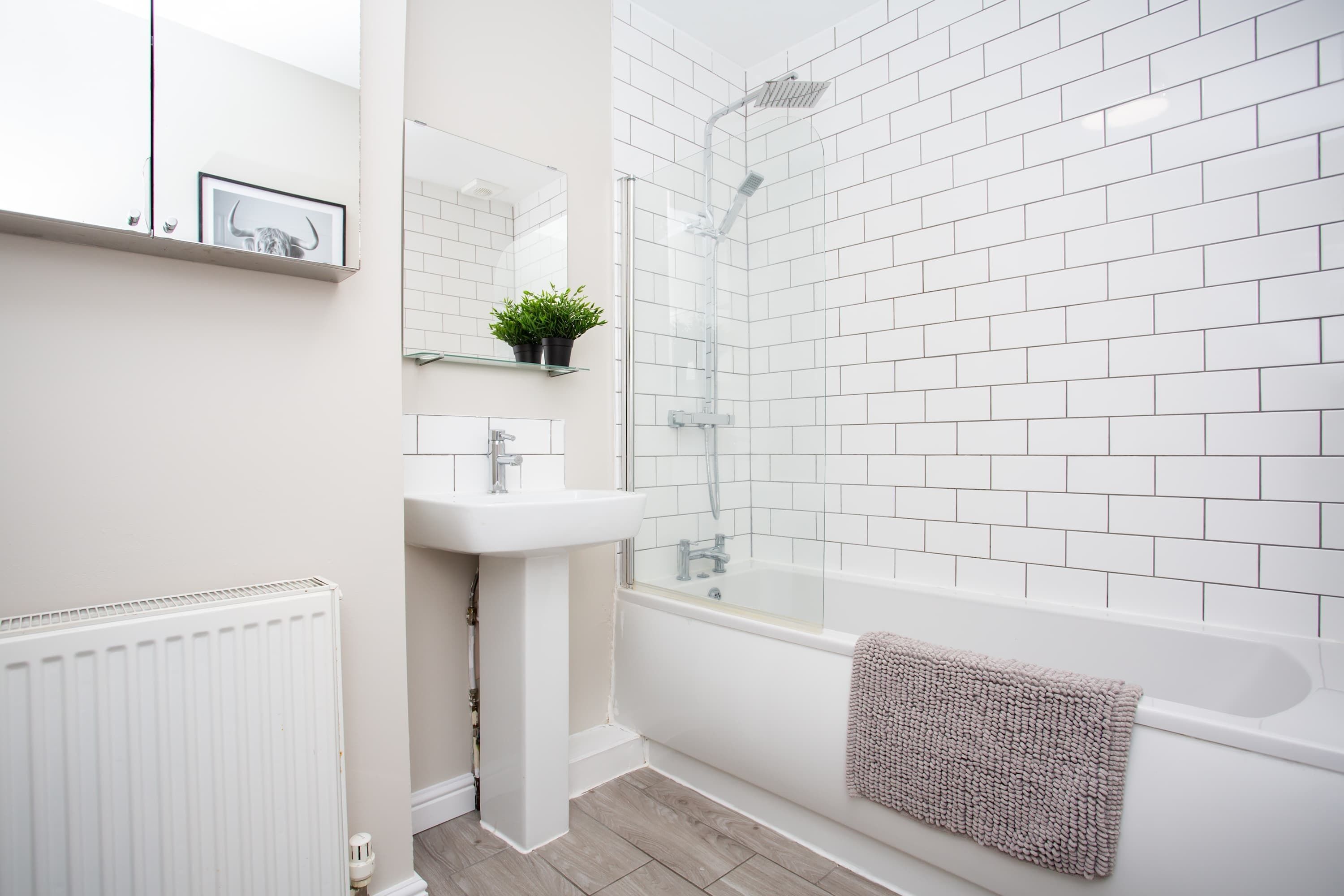 Shower, hair dryer, towels, shampoo
