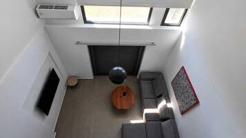 Deluxe appartement, uitzicht op tuin | Woonruimte