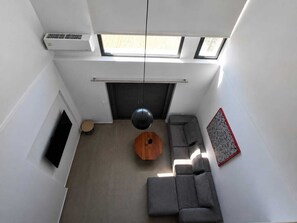 Deluxe appartement, uitzicht op tuin | Woonruimte