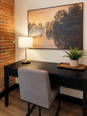 Interior - Brick & Bed - 2 Bedroom Riverfront Loft (St. Louis)