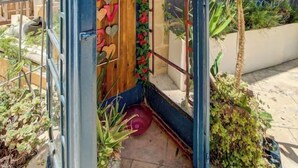 A telephone booth with a sign reading 'TELEPHONE' and a wooden interior. - Gozo Couples Bungalow No 3 · Pool Use & Own Cabana (Gozo)