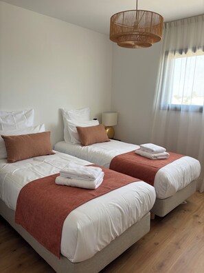 2 slaapkamers, een strijkplank/strijkijzer, wifi, beddengoed