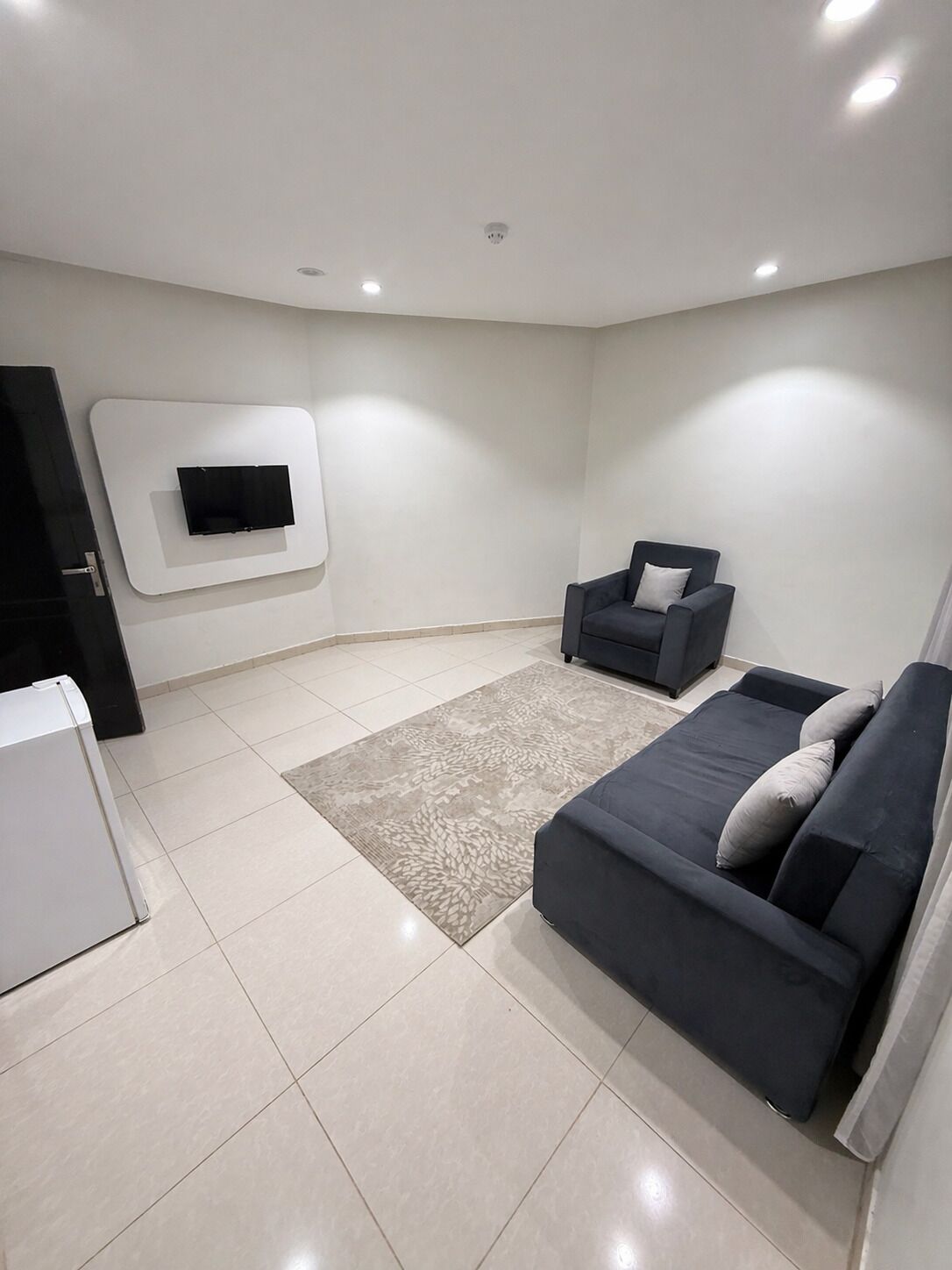 Apartment, 1 Bedroom | Living area | 32-inch flat-screen TV with satellite channels