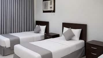 Premium bedding, down comforters, in-room safe, iron/ironing board
