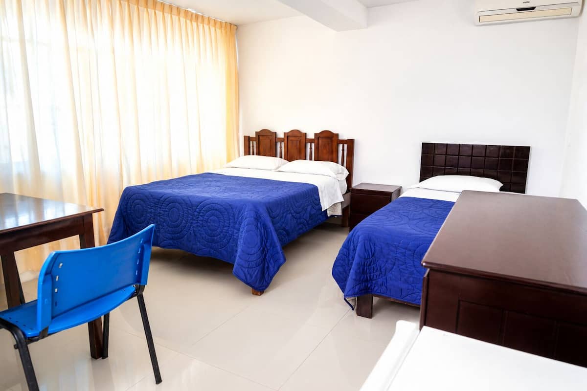 Standard Triple Room | Desk, laptop workspace, WiFi (free), bed sheets