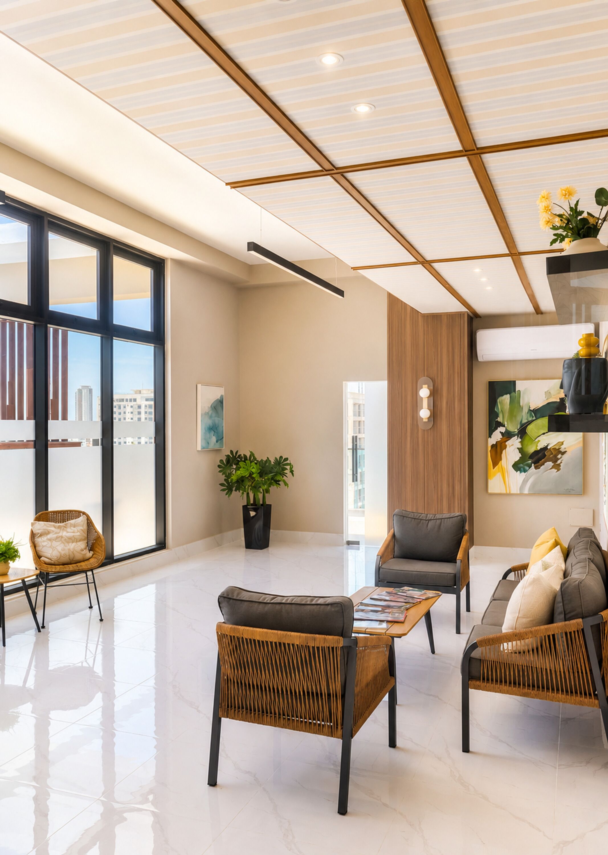 A spacious living area with a large window, a potted plant, and a modern ceiling design.