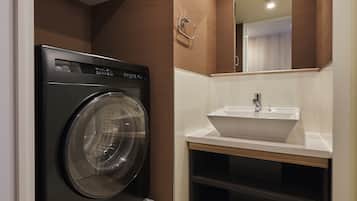 Shower, hair dryer, slippers, towels