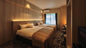 Twin Room | Blackout drapes, iron/ironing board, WiFi (free)