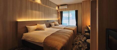 Twin Room | Blackout drapes, iron/ironing board, WiFi (free)